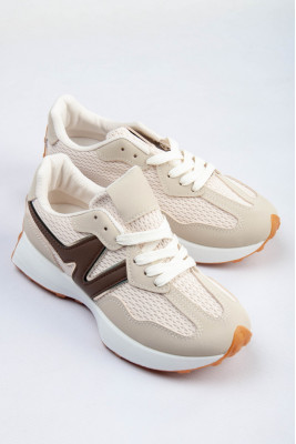 Кросівки жіночі